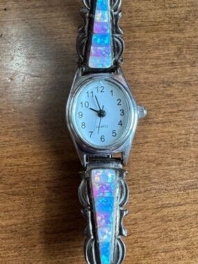 Sterling silver quartz watch by Gary Yazzie with channel inlay.